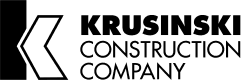 Krusinski Construction Company logo representing leadership in real estate development and construction solutions across the Chicago area and beyond.